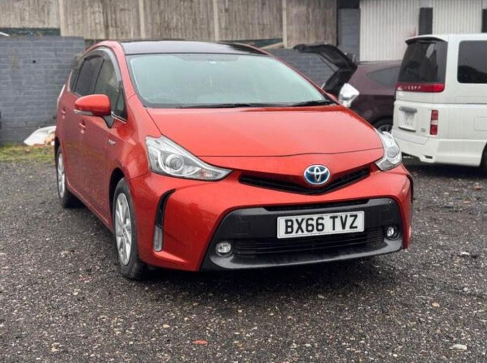 Red Toyota Prius Plus